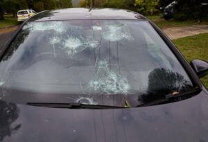 Car windshield cracked by severe hail damage