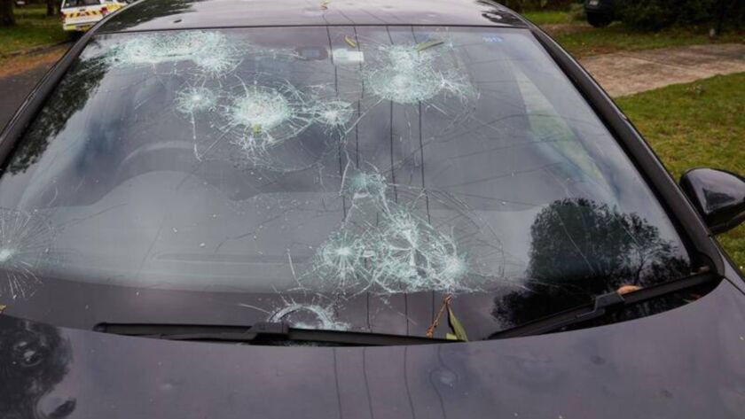 Car windshield cracked by severe hail damage